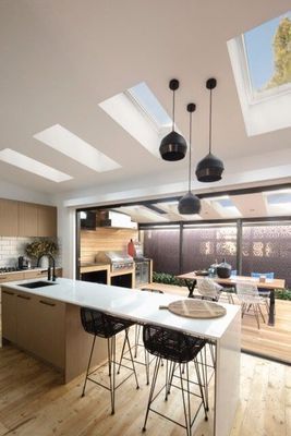 Modern Kitchen With Island, Pendant Lights, and Skylights — R&M Sheetmetal Nowra Metal Roofing in South Nowra, NSW