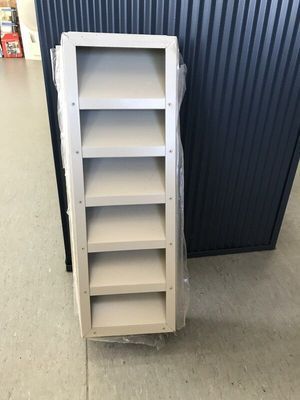 Beige Shelving Unit With Six Shelves, in Plastic Wrap — R&M Sheetmetal Nowra Metal Roofing in South Nowra, NSW