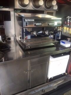 Stainless Steel Coffee Machine on a Counter Inside a Mobile Coffee Shop — R&M Sheetmetal Nowra Metal Roofing in South Nowra, NSW