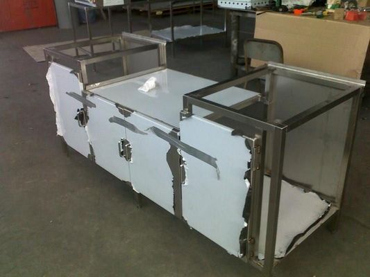 Stainless Steel Work Table With Peeling Protective Film — R&M Sheetmetal Nowra Metal Roofing in South Nowra, NSW