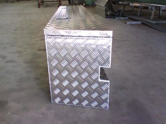 Silver Metal Toolbox With a Diamond Plate Pattern on a Concrete Floor — R&M Sheetmetal Nowra Metal Roofing in South Nowra, NSW