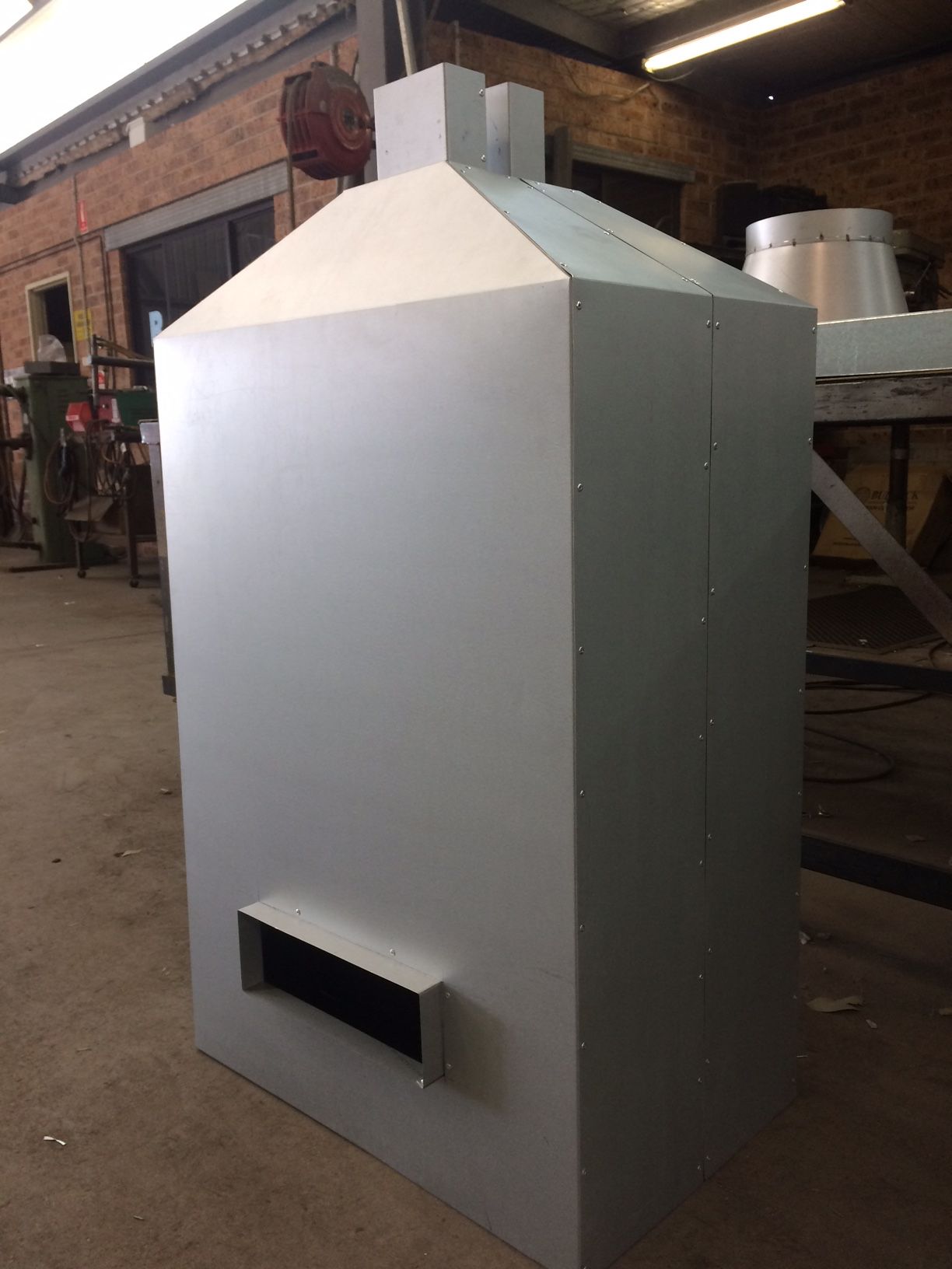 Silver Metal Rectangular Industrial Structure — R&M Sheetmetal Nowra Metal Roofing in South Nowra, NSW