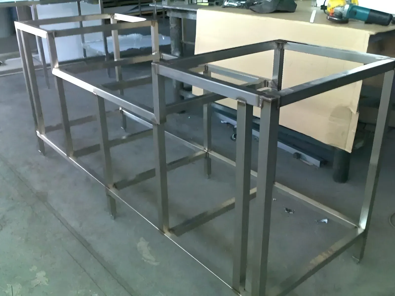 A Stainless Steel Frame Is Sitting on A Concrete Floor — R&M Sheetmetal Nowra Metal Roofing in Ulladulla, NSW