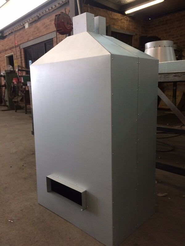 A White Box with A Chimney on Top of It — R&M Sheetmetal Nowra Metal Roofing in South Nowra, NSW
