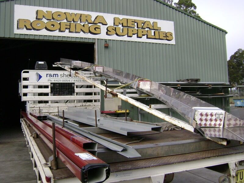 A Truck Carrying Roofing Supplies — R&M Sheetmetal Nowra Metal Roofing in South Nowra, NSW