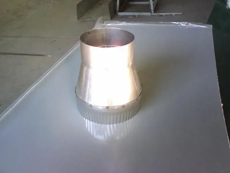 Metal duct transition on a reflective sheet. — R&M Sheetmetal Nowra Metal Roofing in South Nowra, NSW