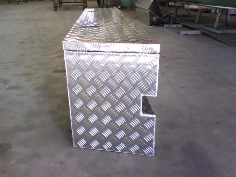 A Metal Box Is Sitting on A Concrete Floor — R&M Sheetmetal Nowra Metal Roofing in Ulladulla, NSW