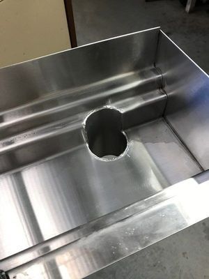 A Stainless Steel Sink with A Hole in The Middle of It — R&M Sheetmetal Nowra Metal Roofing in Vincentia, NSW