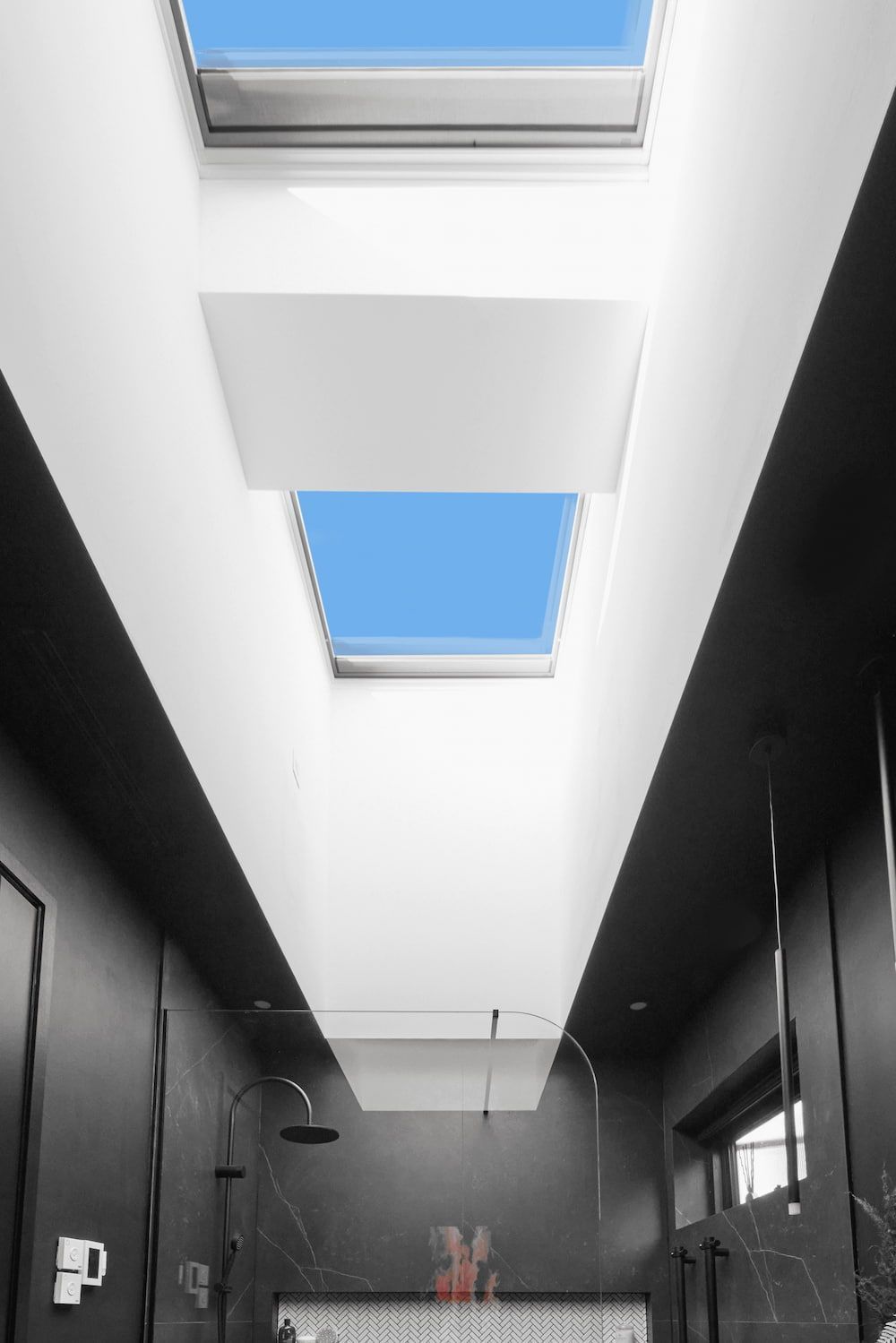 A Bathroom with A Skylight and A Shower Head — R&M Sheetmetal Nowra Metal Roofing in Ulladulla, NSW