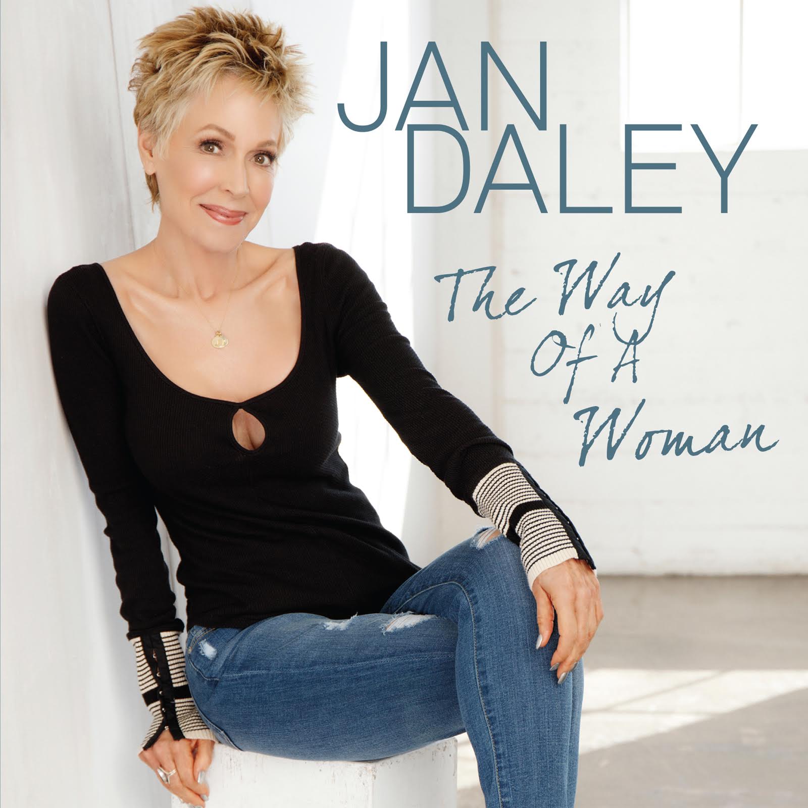 A woman is sitting on a chair on the cover of the way of a woman