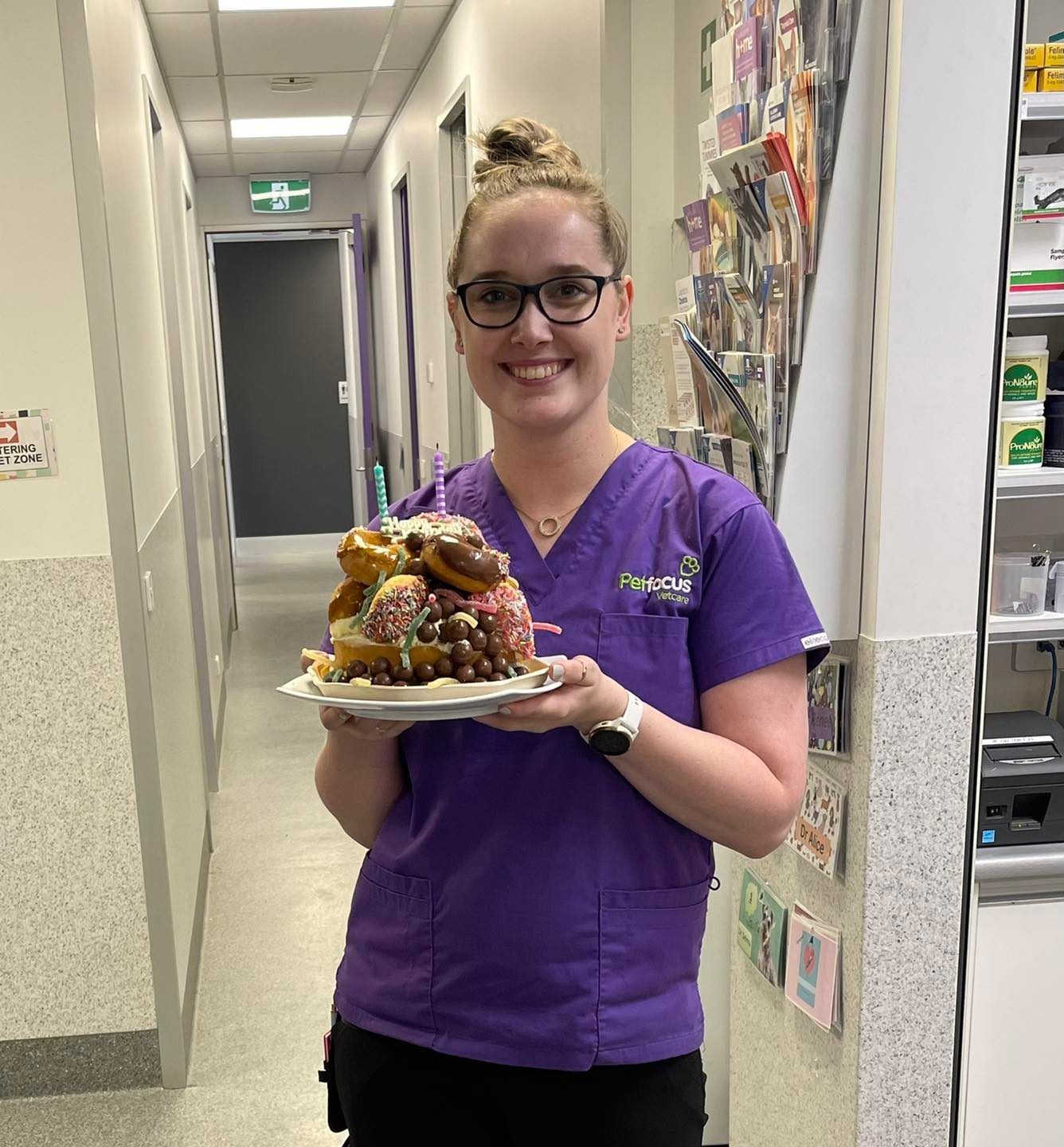 Nurse Vet Holding Cake — Albury, NSW — Petfocus Vetcare