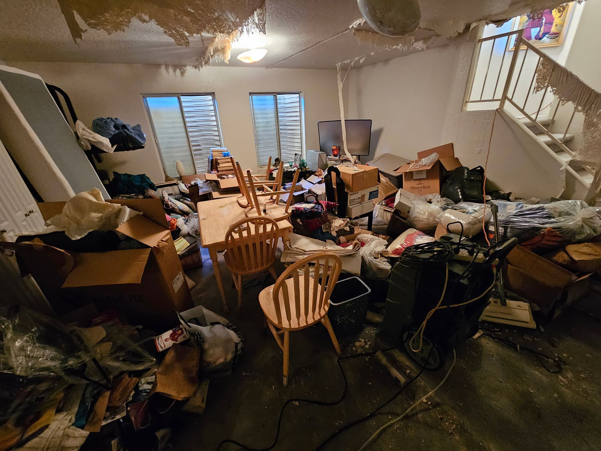 A room filled with lots of boxes and chairs.