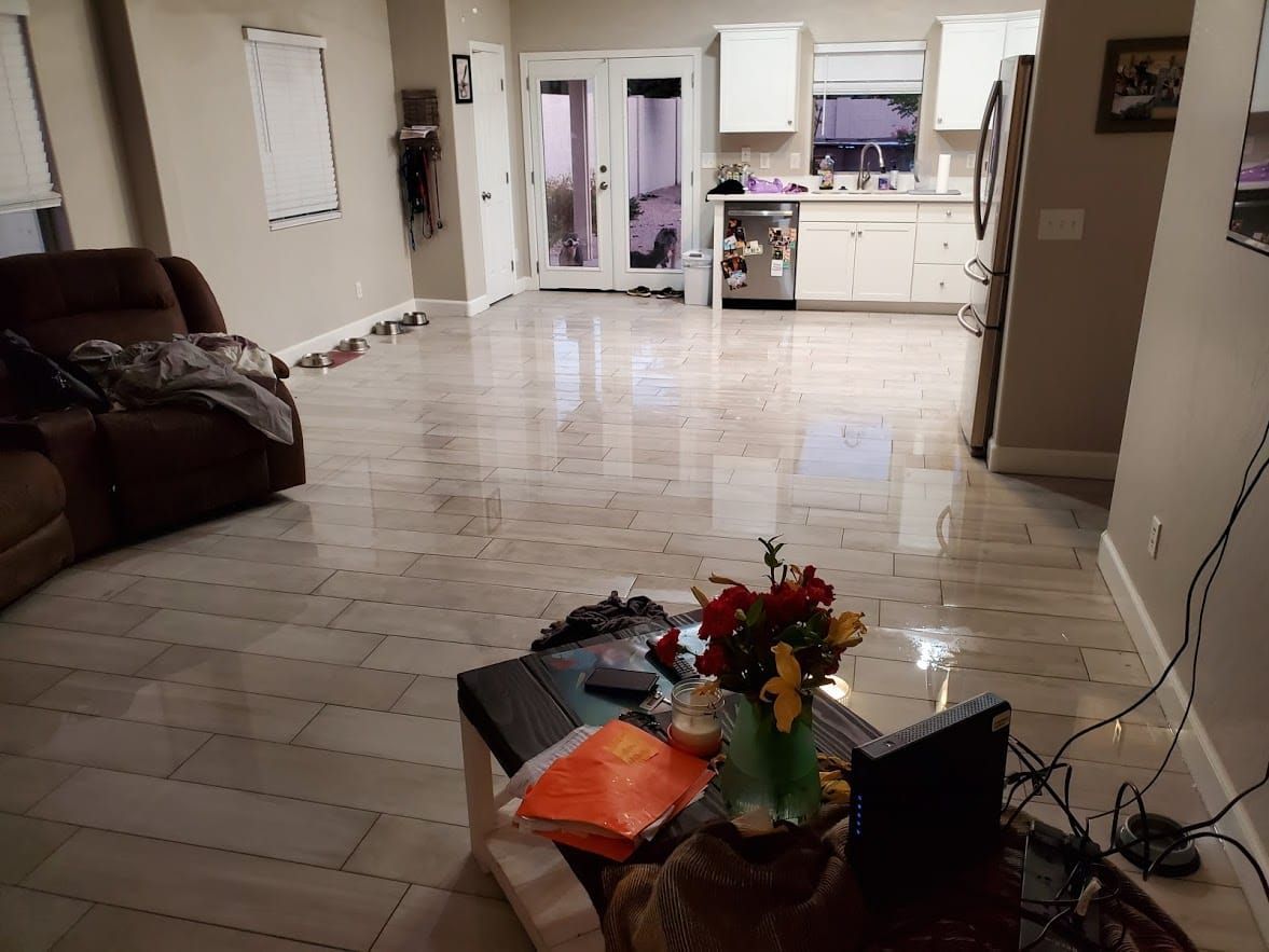 A living room with a coffee table and a couch