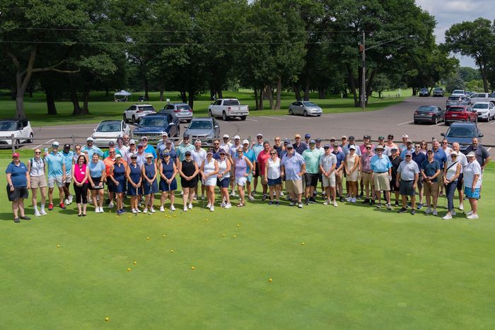 Group photo of all golfers, staff, and volunteers at Chip In For Children