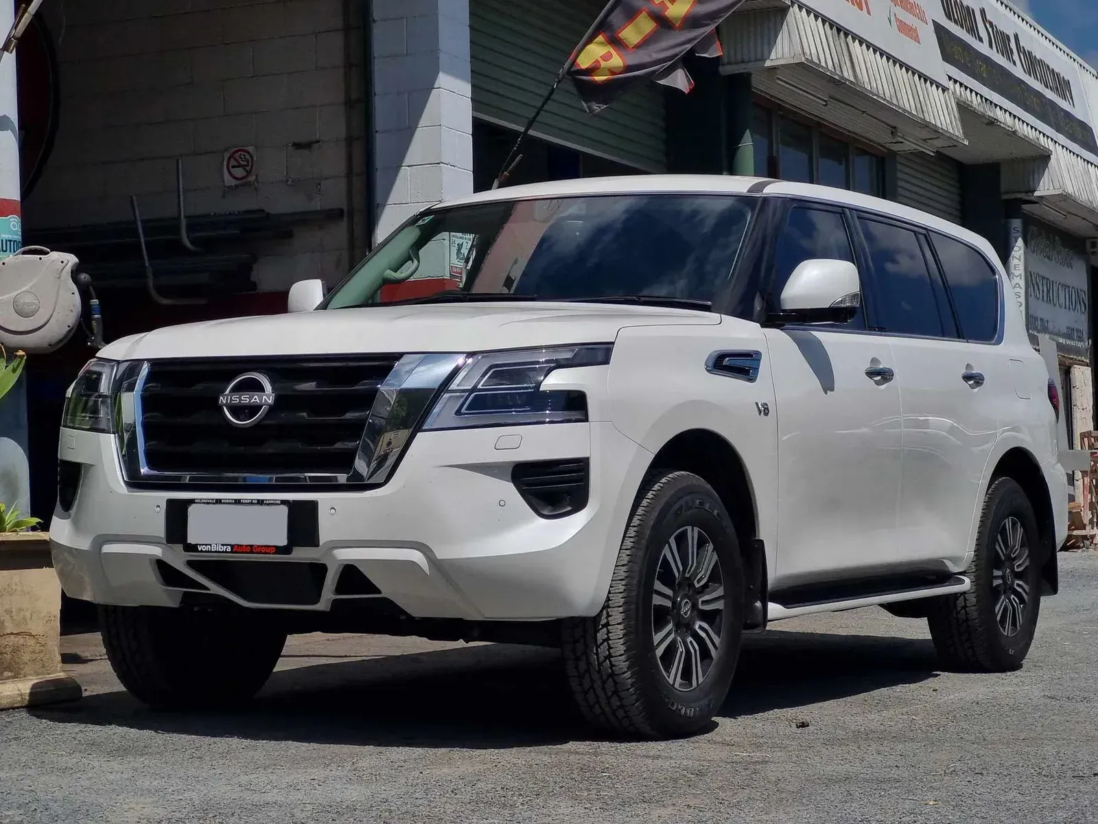 White Nissan Patrol SUV — BJM Mechanical Mufflers & Tyres in Oxenford, QLD