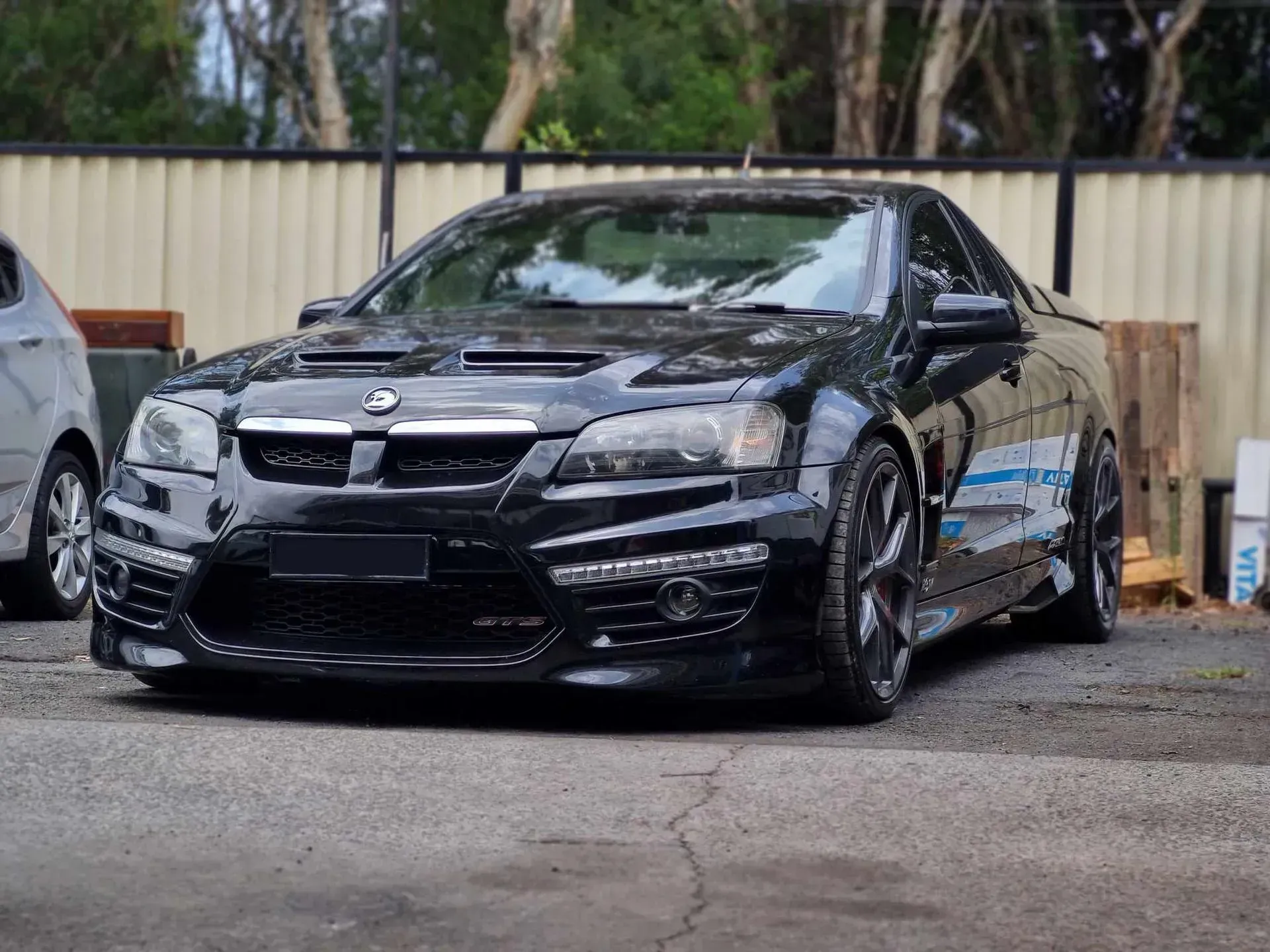 Black Holden Ute Parked Outside — BJM Mechanical Mufflers & Tyres in Oxenford, QLD