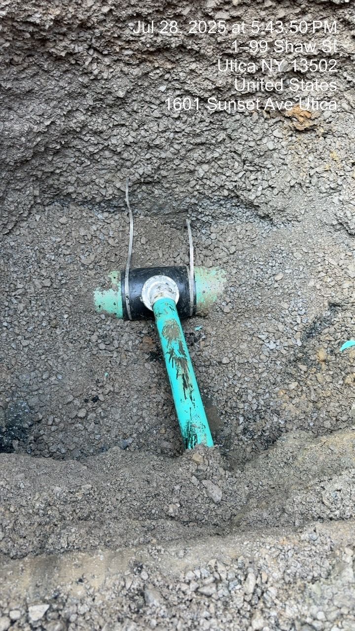 The inside of a moving truck filled with boxes and blankets.