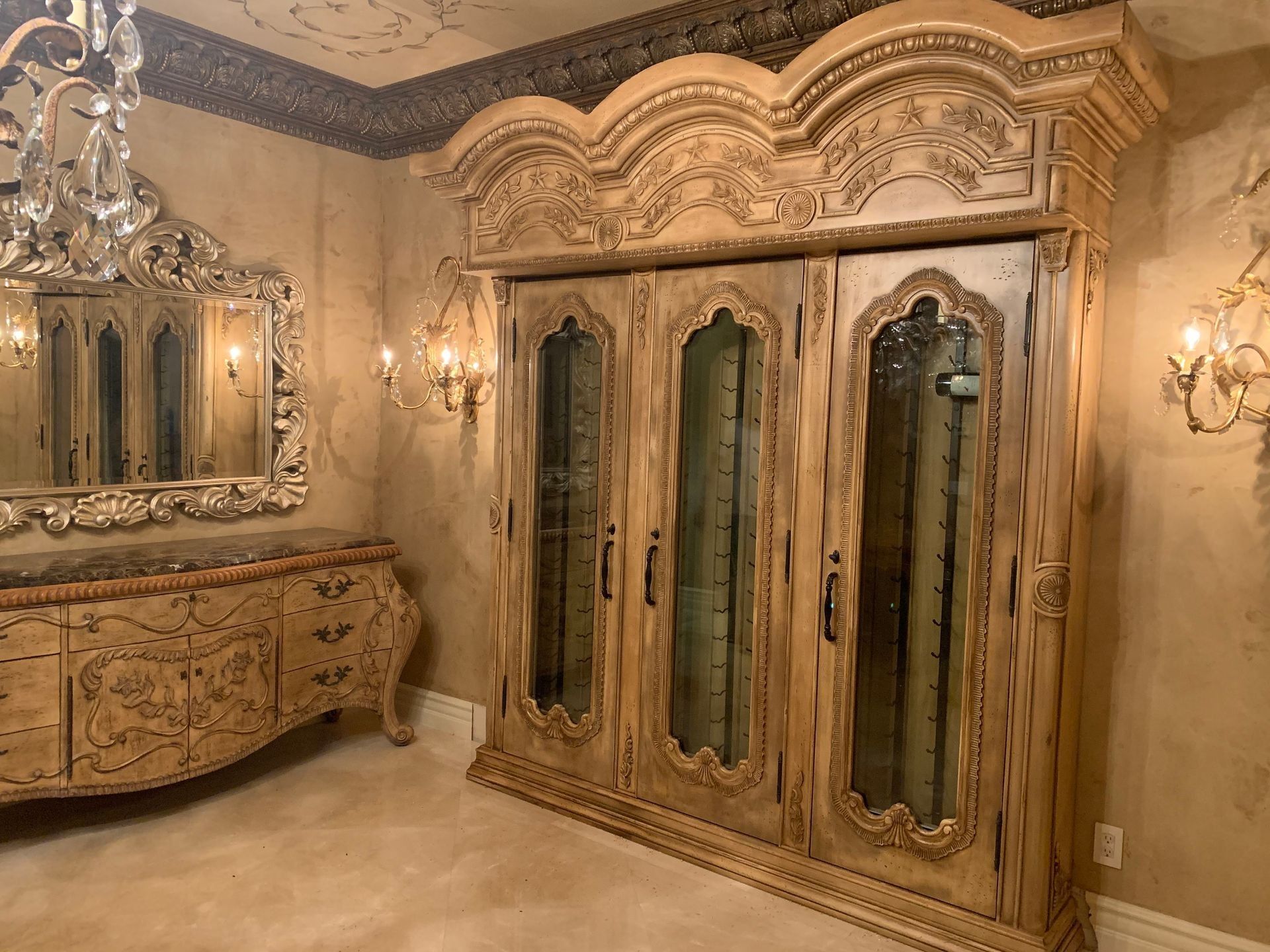 A bathroom with a large wooden cabinet and a mirror.