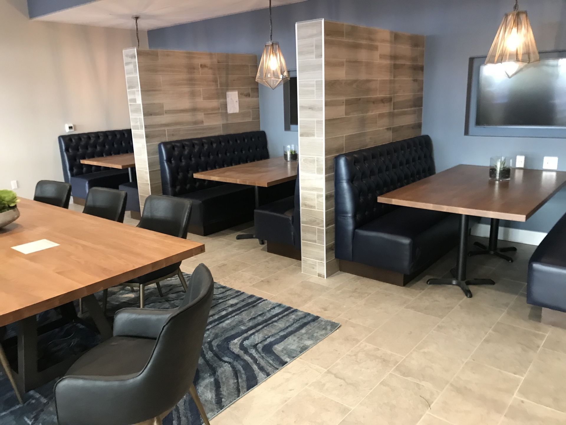 A room with tables and chairs in it