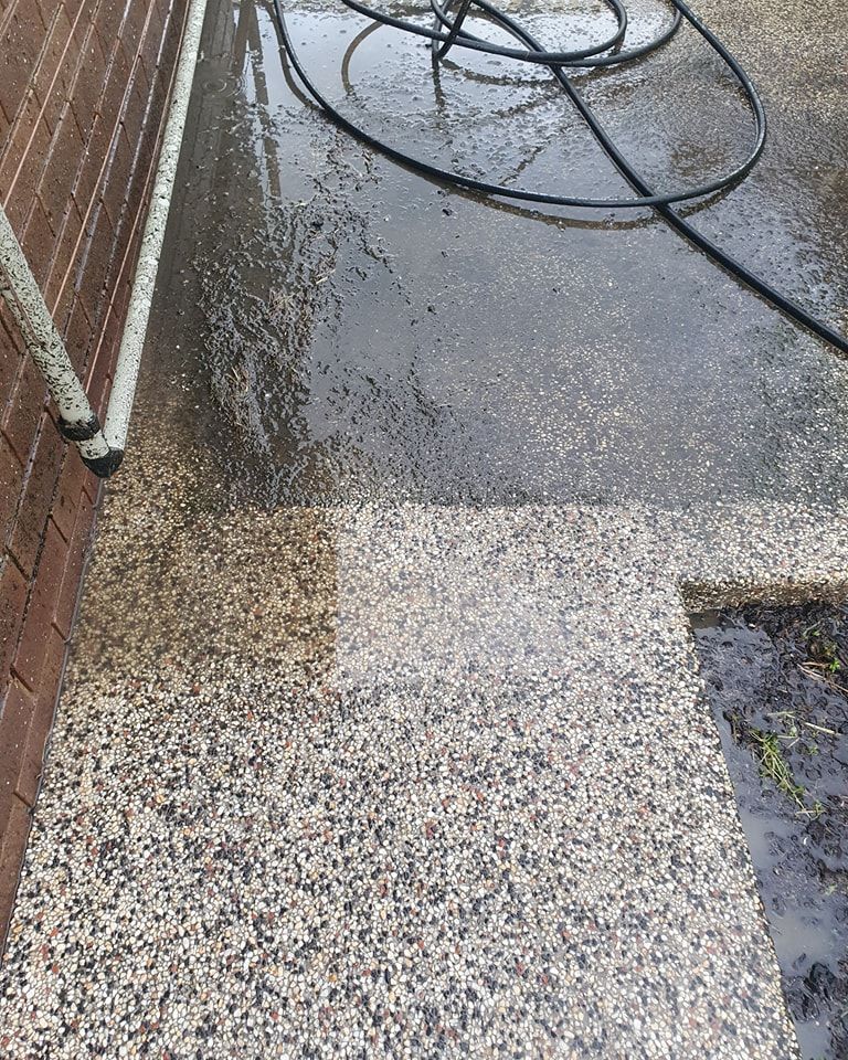 A Pavement Outdoor Brick Home Showing Half Pressure Cleaned And Half Dirty — Bin in a Bath in Saint Albans Park, VIC