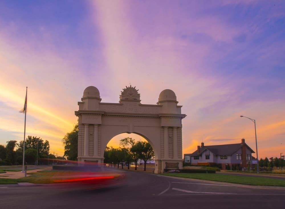 A Car is Driving Under an Archway at Sunset — Bin in a Bath in Ballarat, VIC