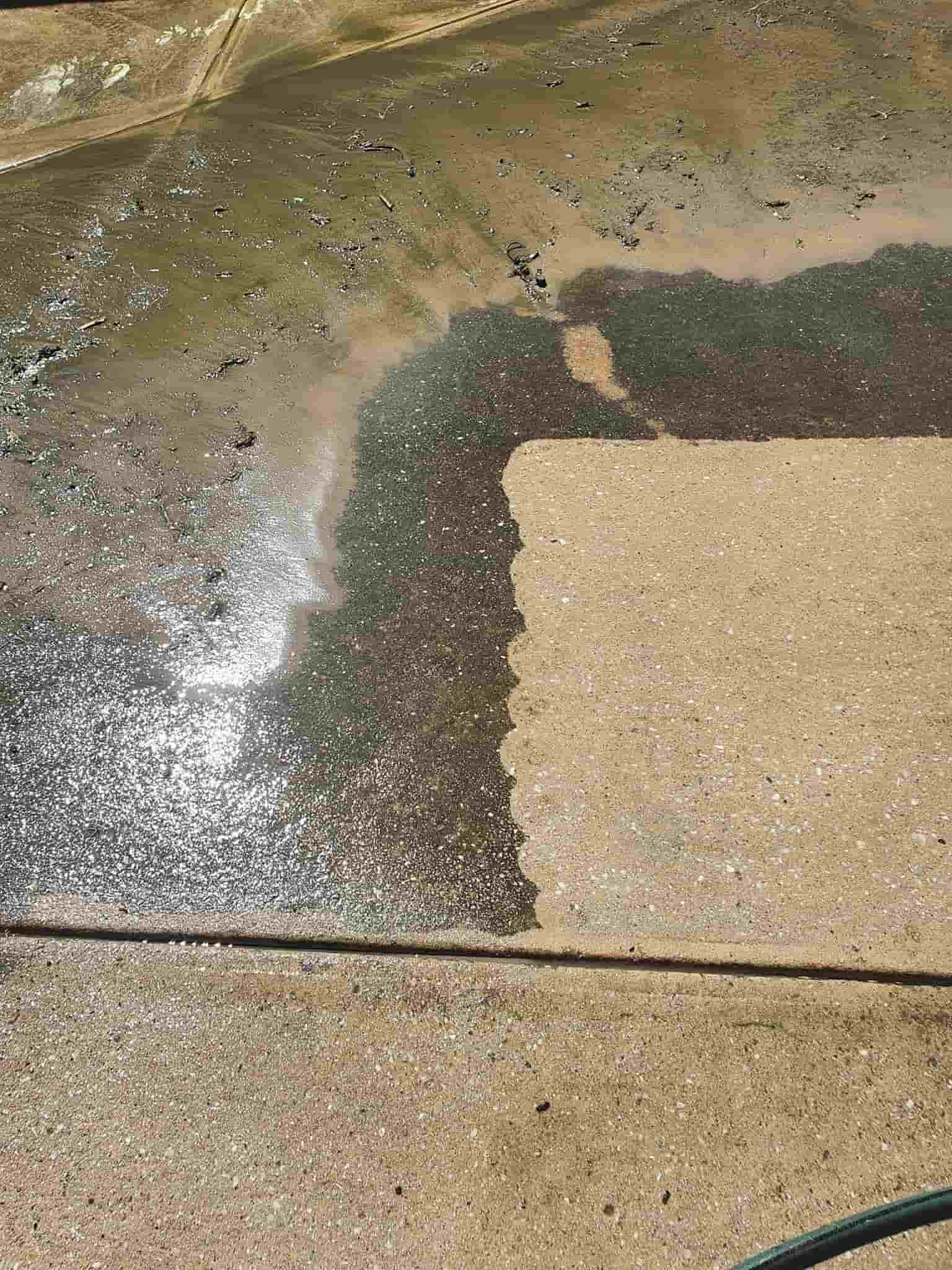 A Close Up of a Concrete Floor Being Cleaned With a Pressure Washer — Bin in a Bath in Ballarat, VIC