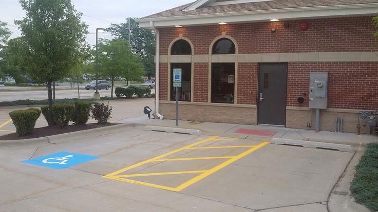 Signage on the parking flooring — Dyer, IN — Pavement Maintenance Solutions, Inc.