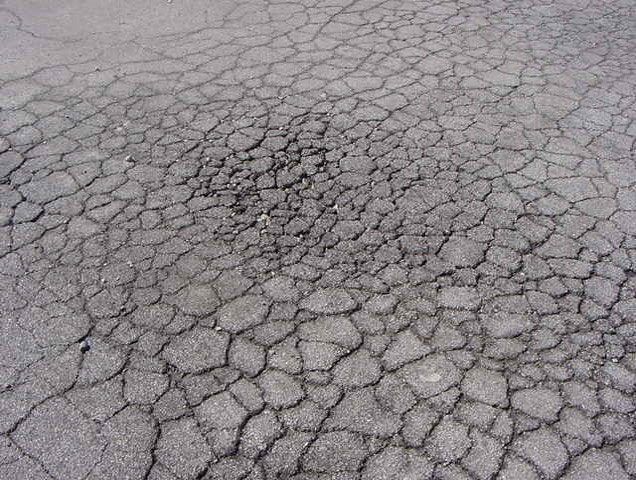 Asphalt alligator cracking — Dyer, IN — Pavement Maintenance Solutions, Inc.