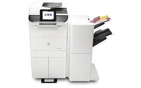 White office printer with touchscreen, paper output tray, and paper input tray.
