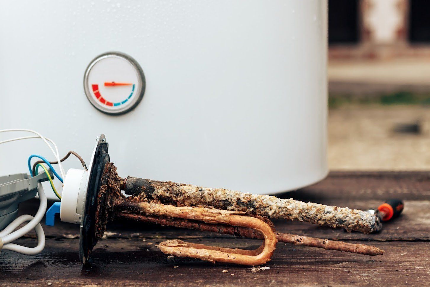 Rusty Water Heater — Seattle, WA — Aurora Plumbing & Electric