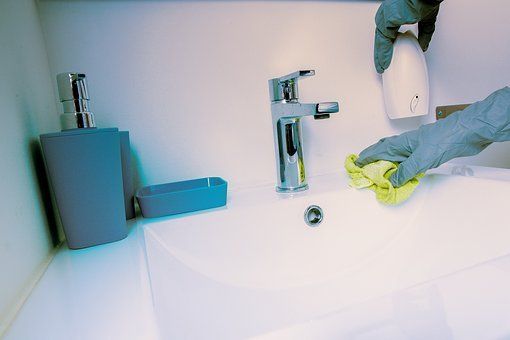 Bathroom sink scrubbing in Menifee house cleaning