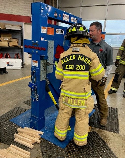 A fireman with the name allen on his back