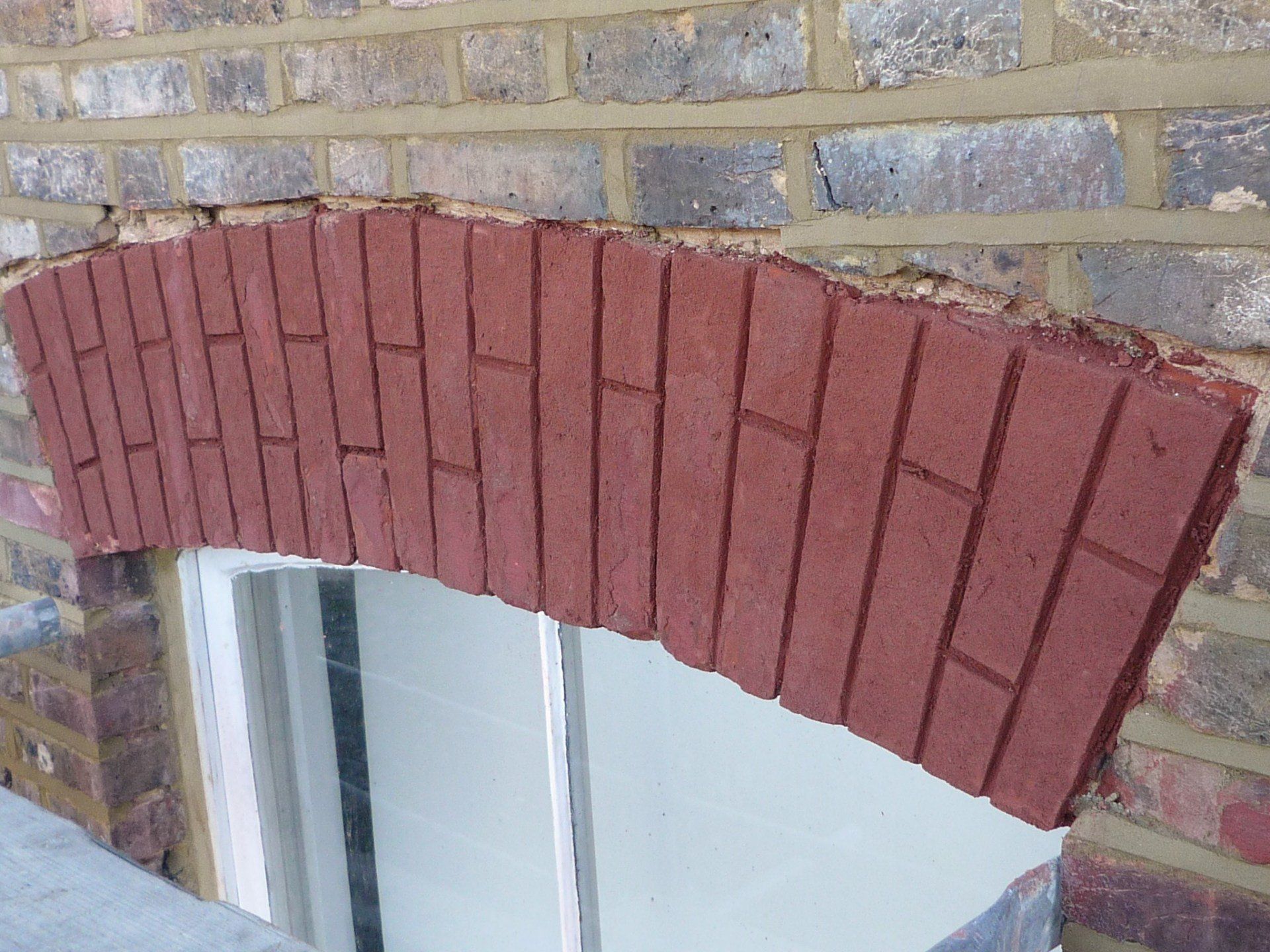 Brick window arch during
