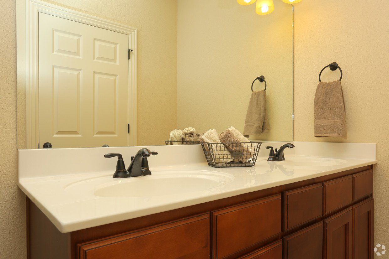 bathroom sink with full mirror