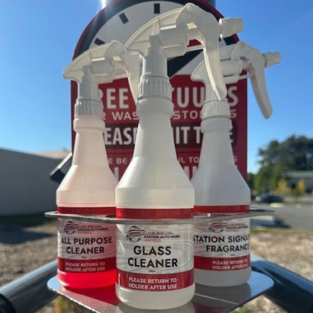 Cleanser spray bottles at a car wash