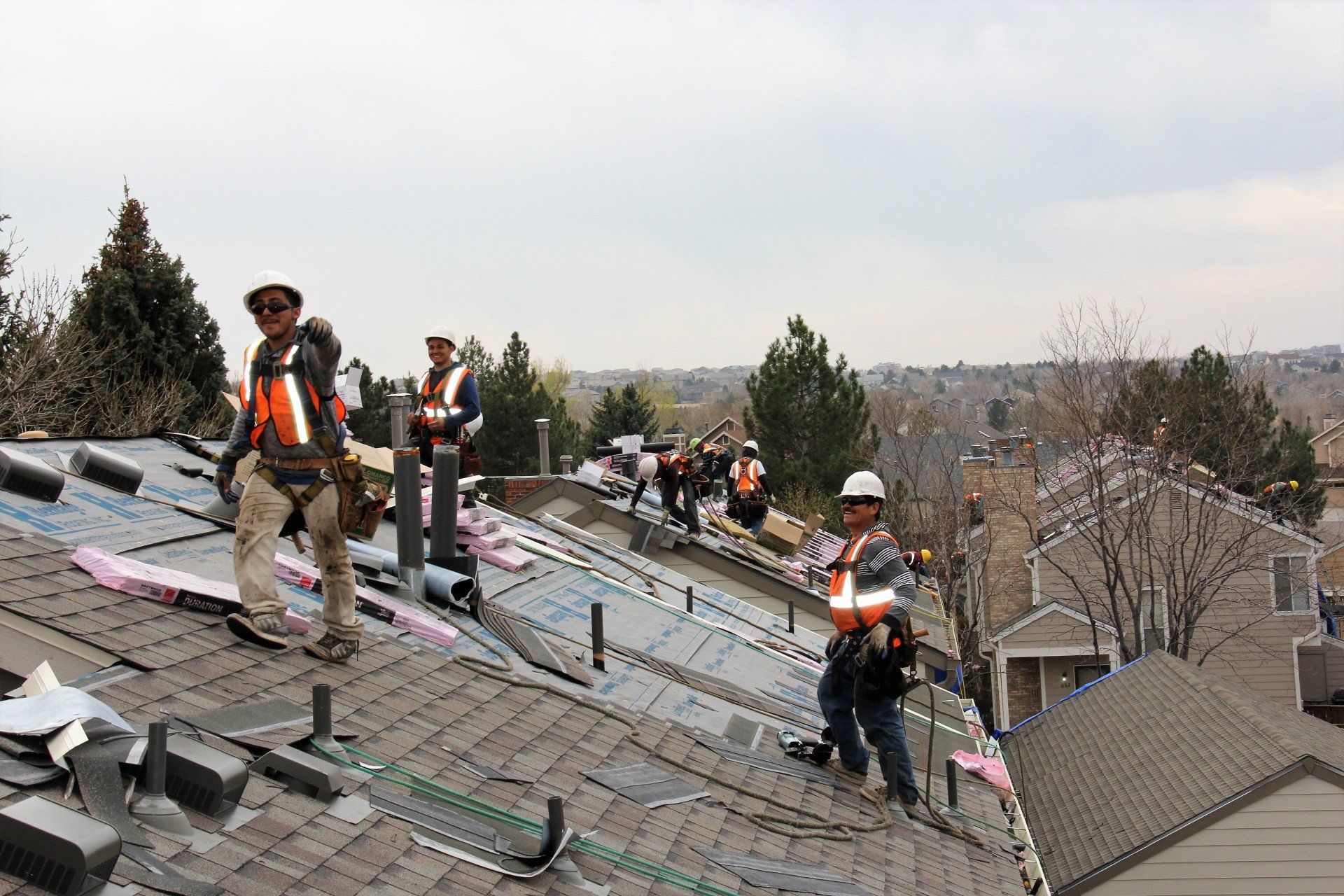 The crew is having fun as they install a new roof.