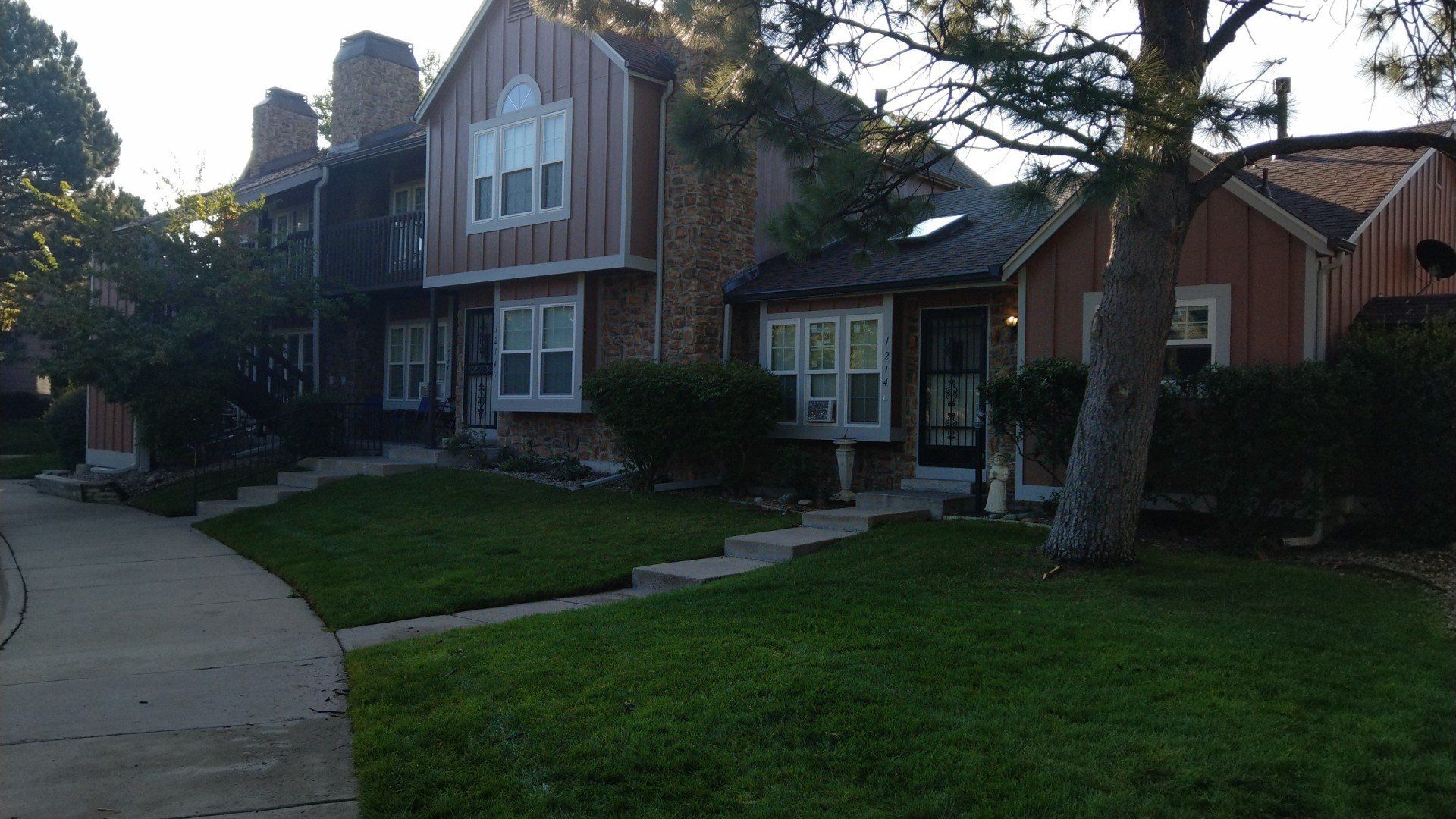 A finished window installation project with multiple sized on a multi-family building.