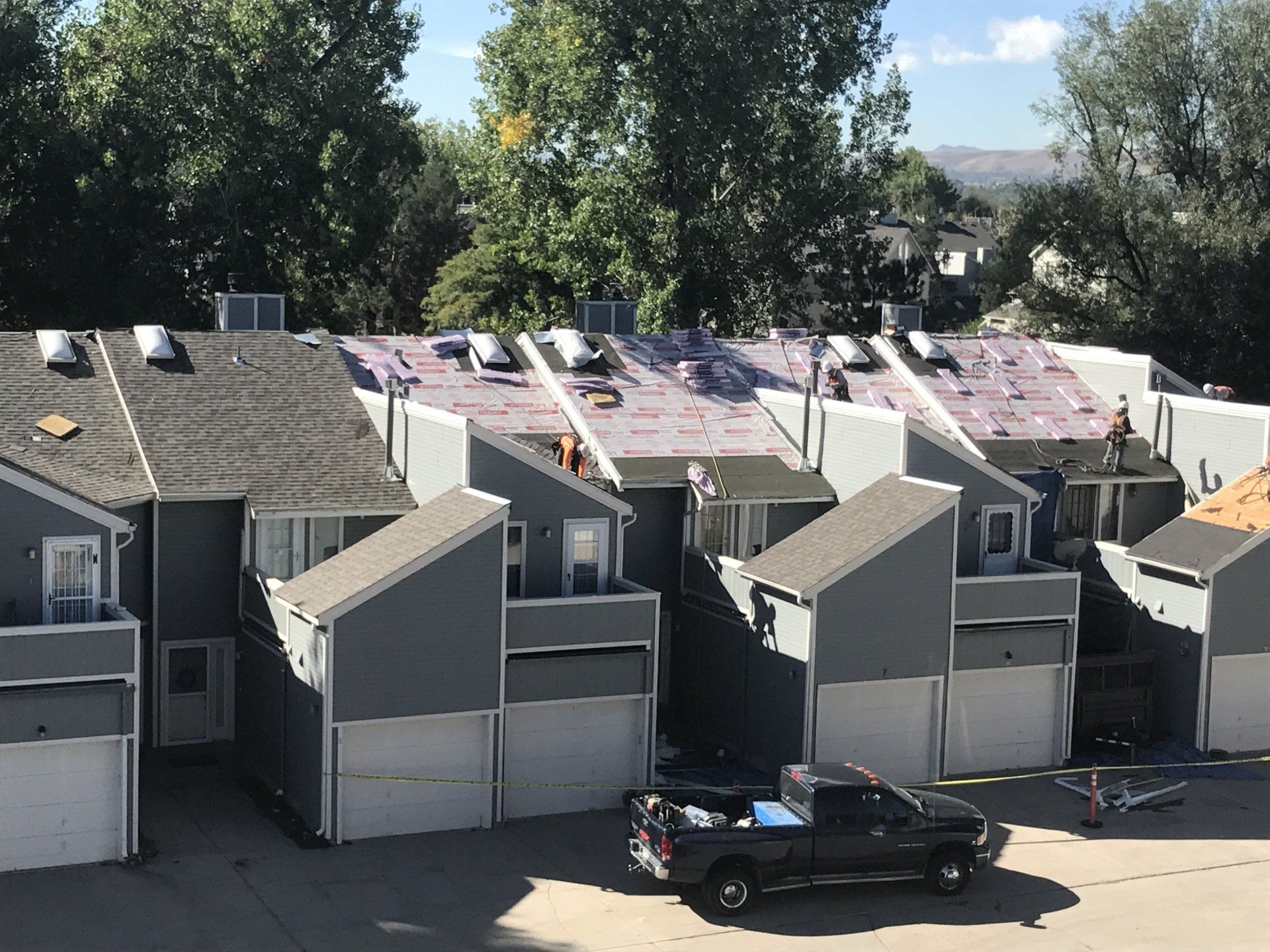 An overview of a job site for a new roof installation.