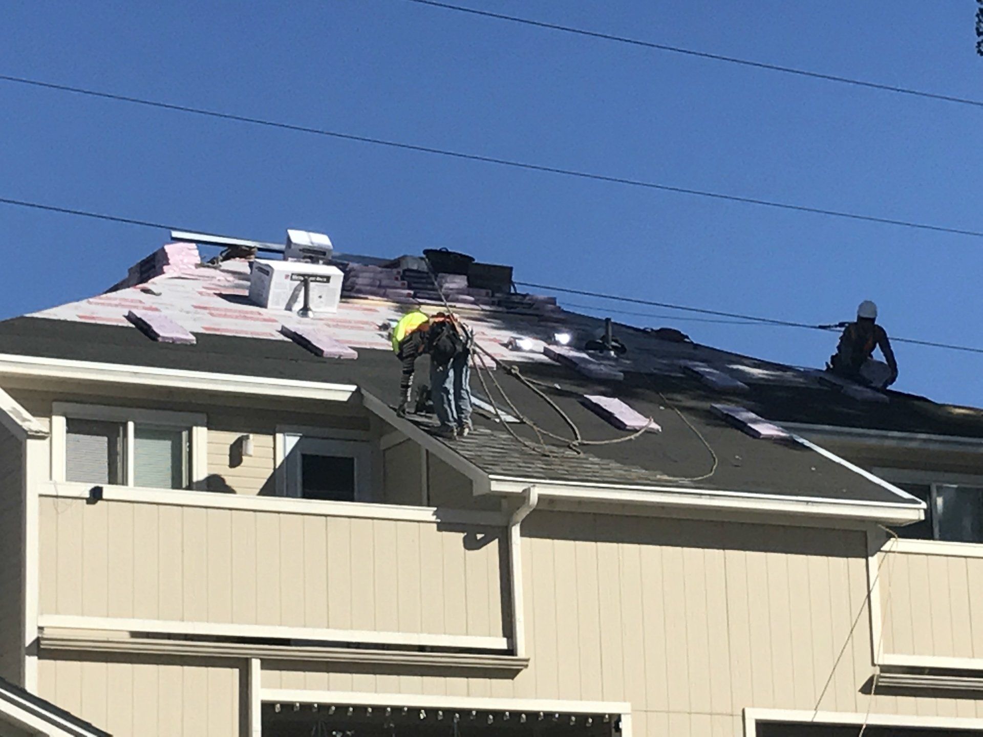 A roof has been prepped and the crew is starting installation.