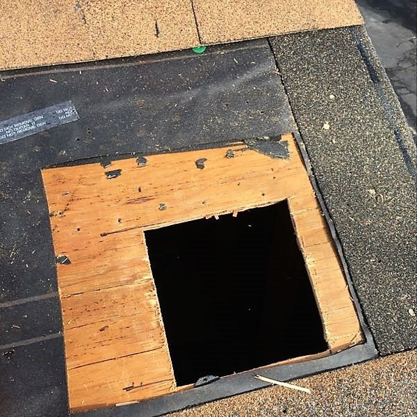 Repaired hole in roof - before.