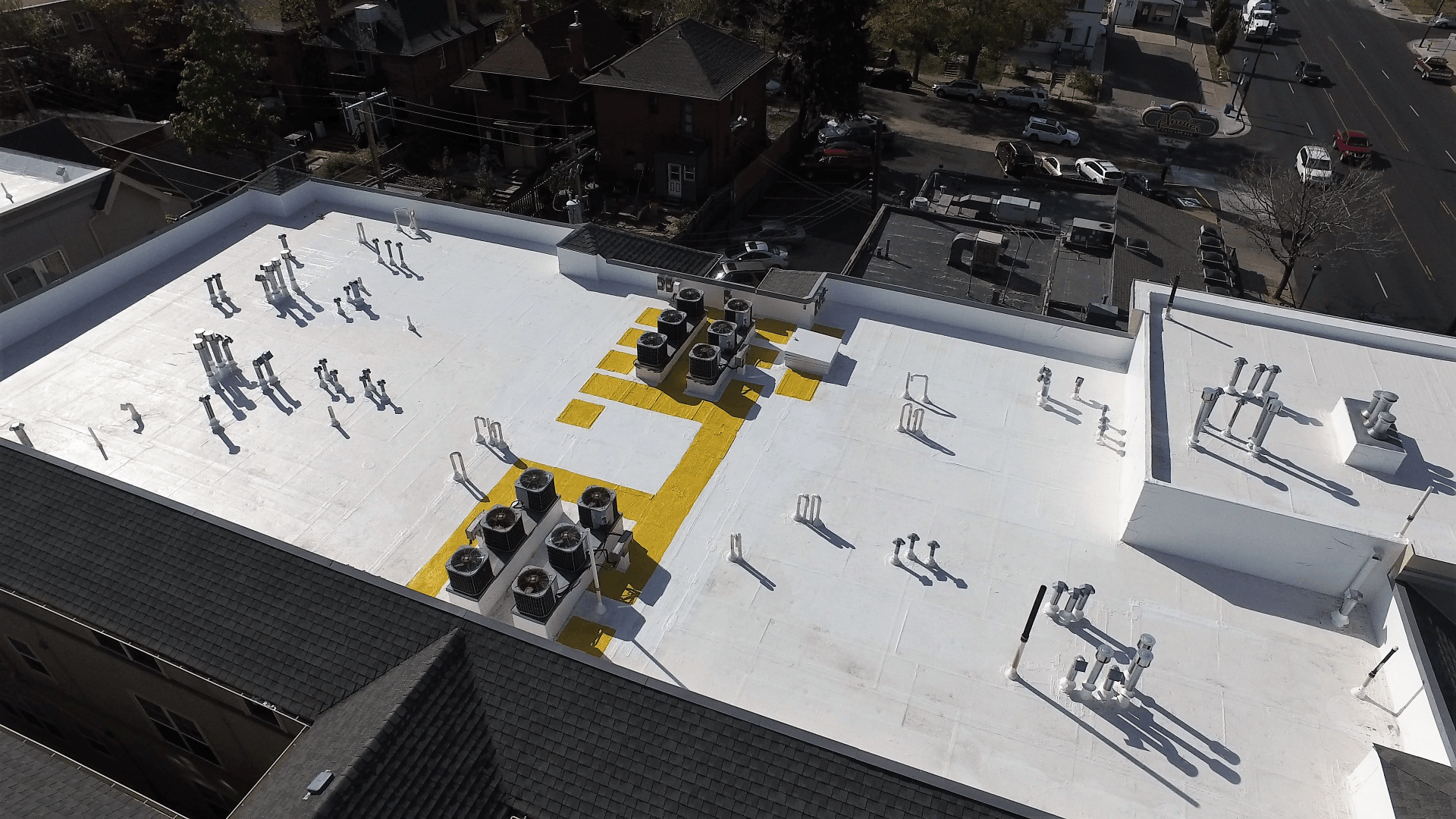 Aerial view of a freshly coated roof.
