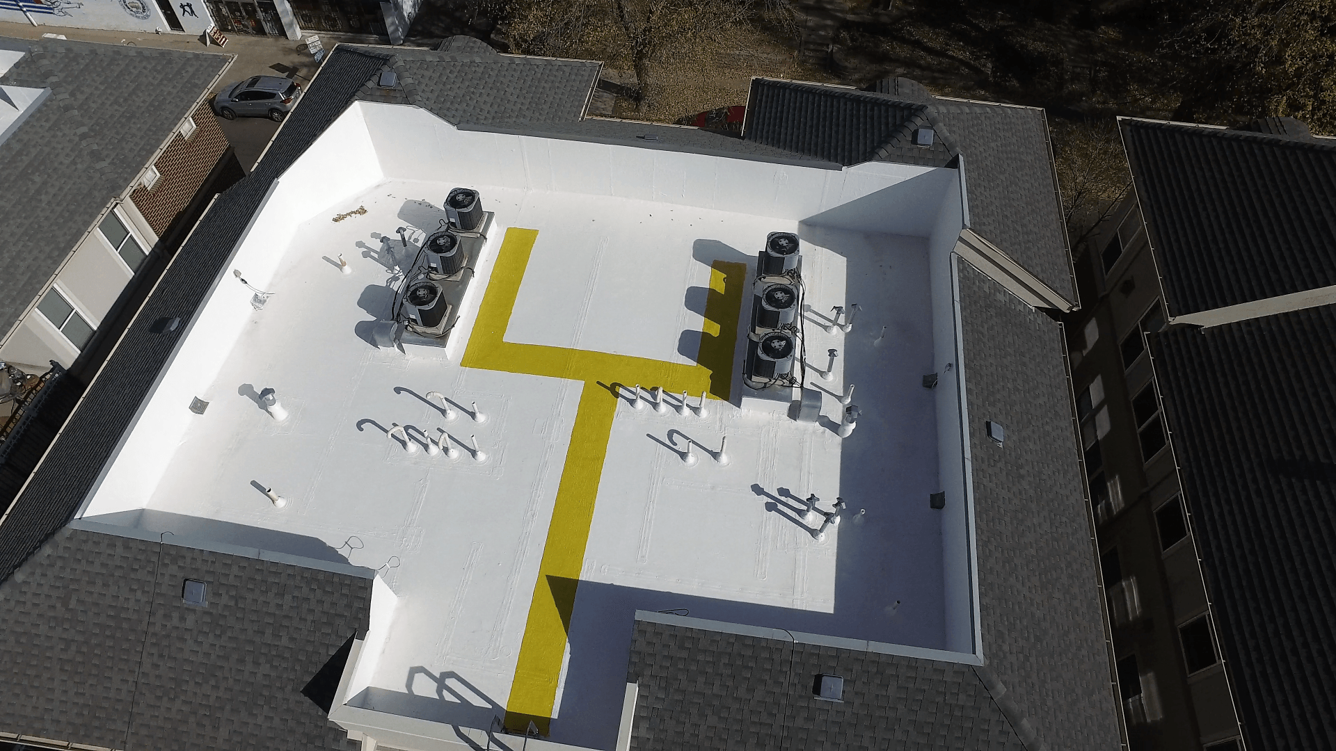 Aerial view of a freshly coated roof.
