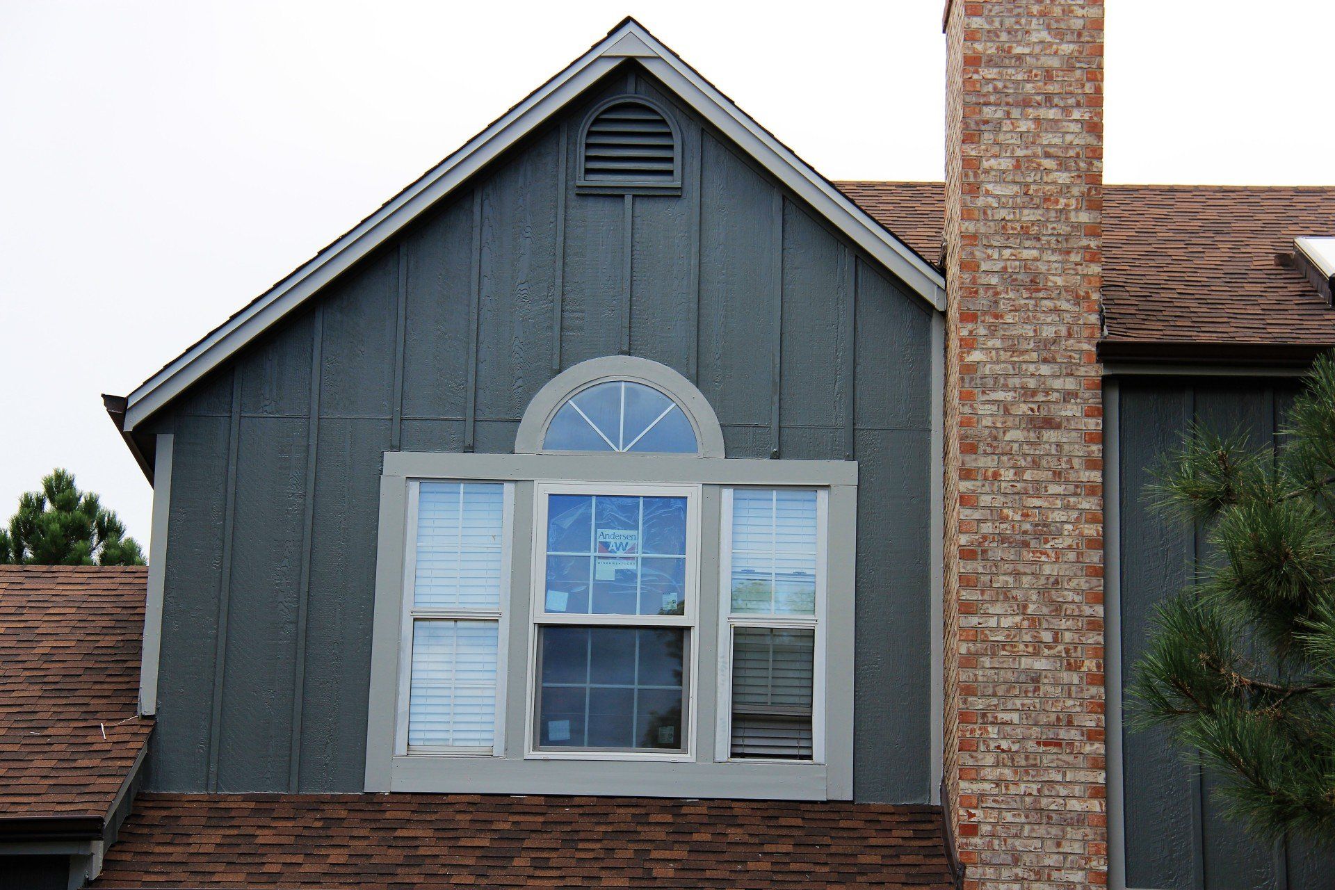 Check out our completed window and siding project (view is of front of residence, second story).