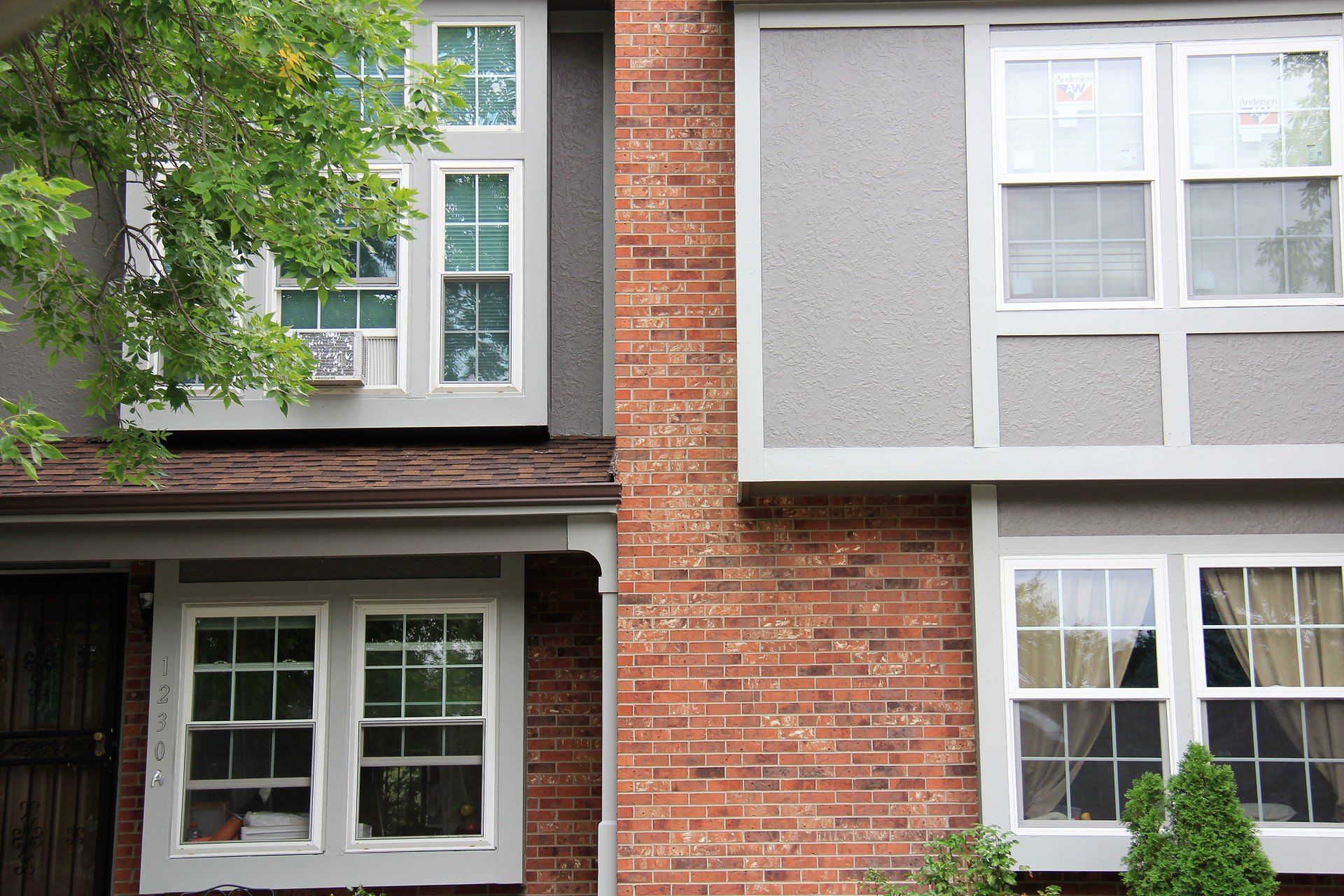 Check out our completed window and siding project (view is of front of residence).