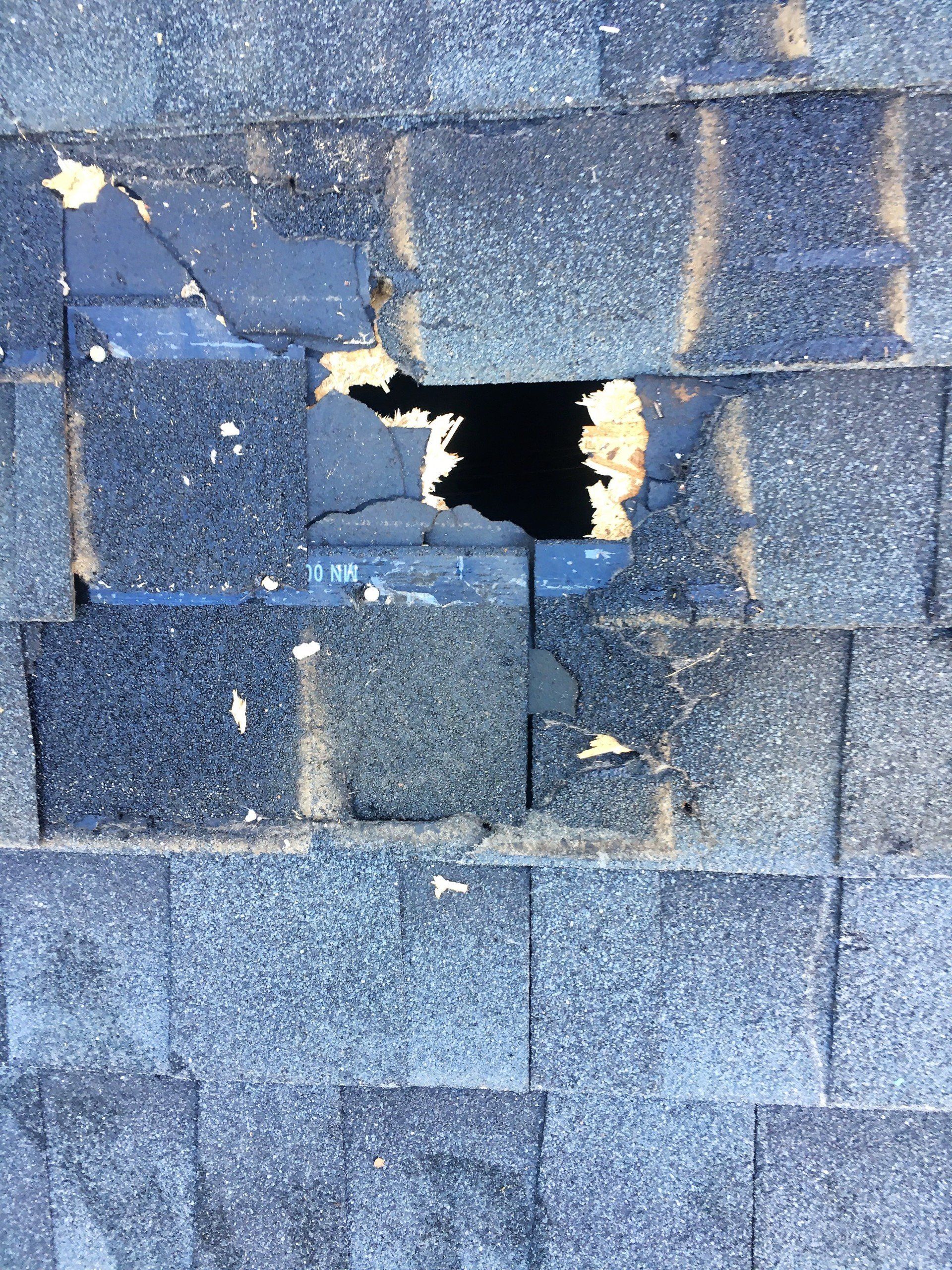 Repaired hole in roof - before.