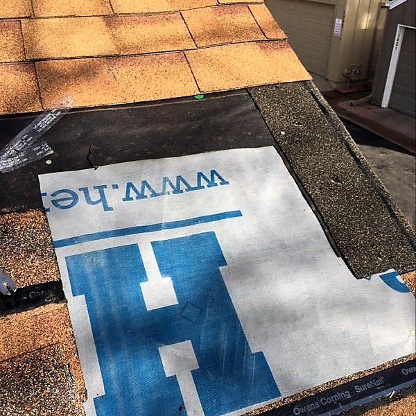 Repaired hole in roof - during.