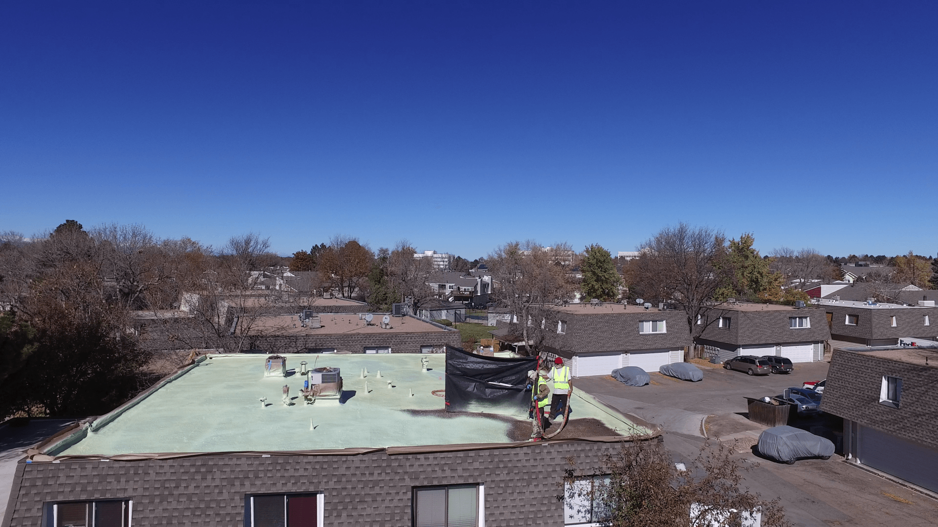 The Park Monaco multi-family complex is getting a fresh roof coating.