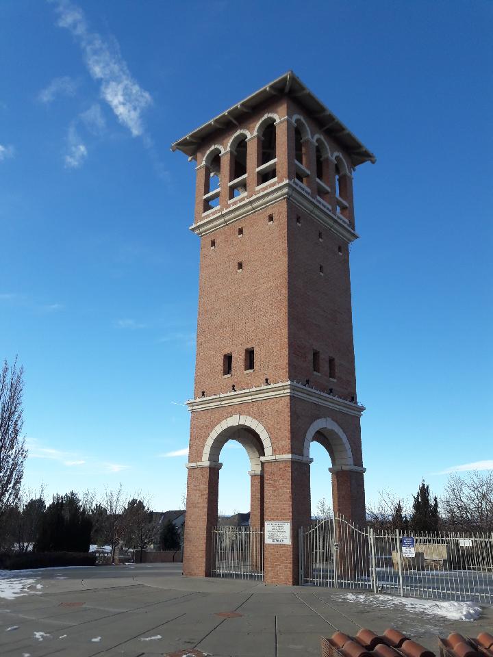 Square turret with new roof.