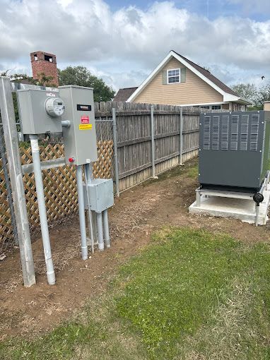 There is a fence in the background and a house in the background.
