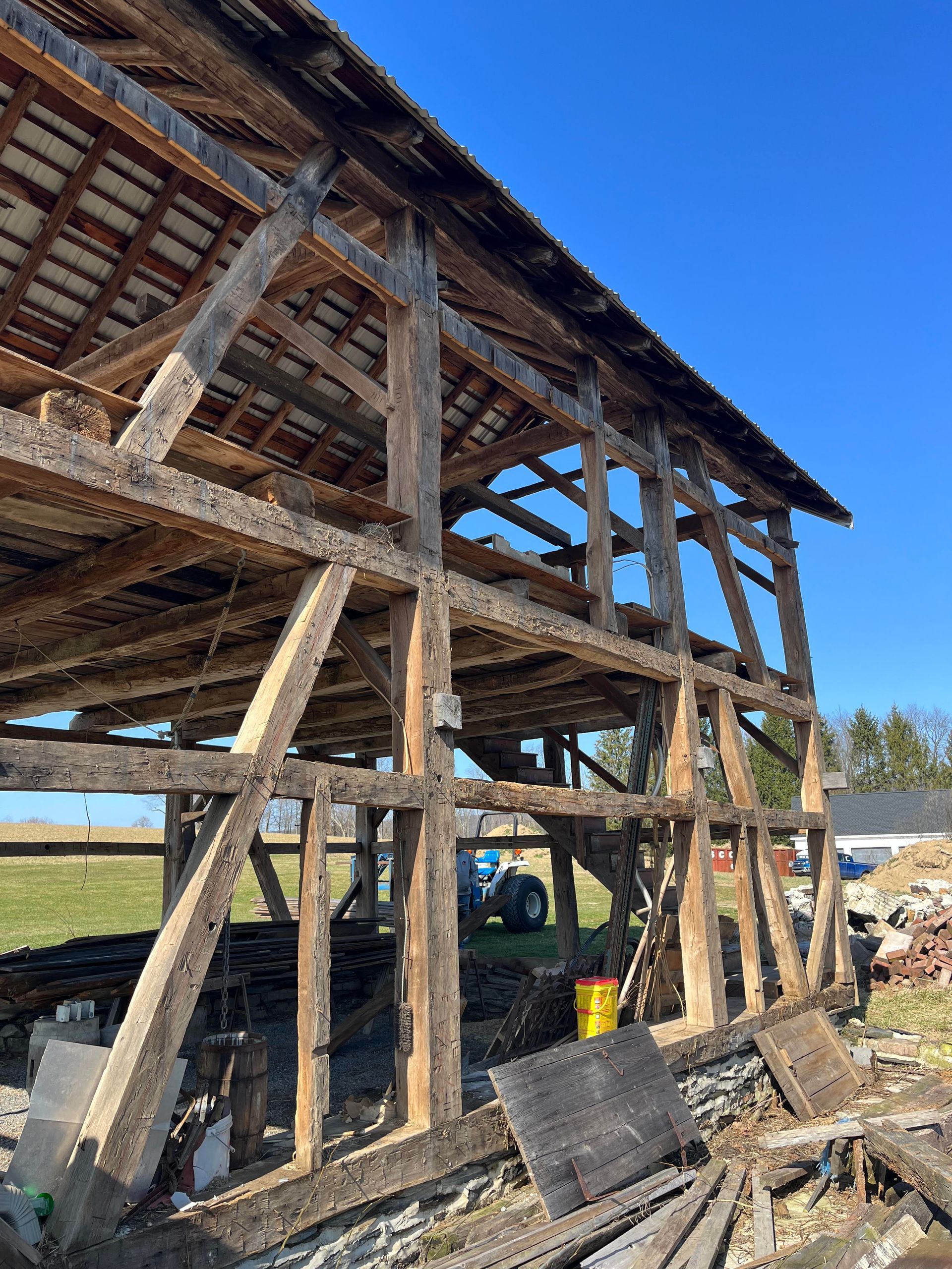 Bay & Bent Pennsylvania aged timber frame vs stick frame weathered wooden barn structure